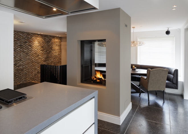 Een haard of houtkachel in de keuken wonen Schouw houtkachel woonkamer