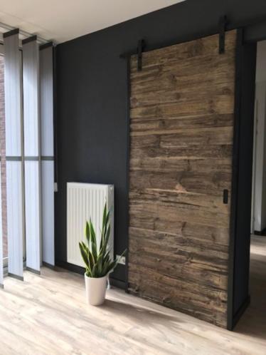 Industriële loftdeur wrakhout