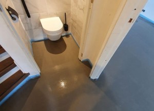 Verwarmde toiletvloer | WARP Systems