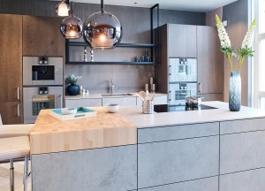Uitgelicht! Designkeuken met betonlook en hout - next125
