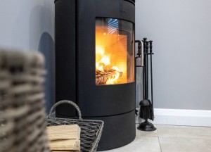 Zo bescherm je je interieur tegen de hitte van een houtkachel - 