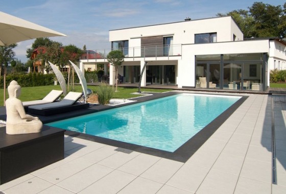 Extra luxe: een zelfreinigend zwembad - Compass Pools.
