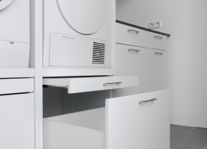 Een wasmachine kast met lade - 