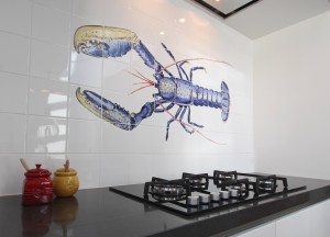 Een echte blikvanger met handgemaakte tegeltableau's - 