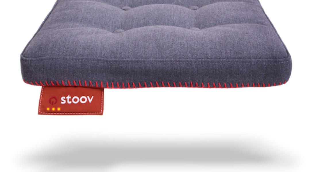 Buiten verwarmd zitten met warmtekussen