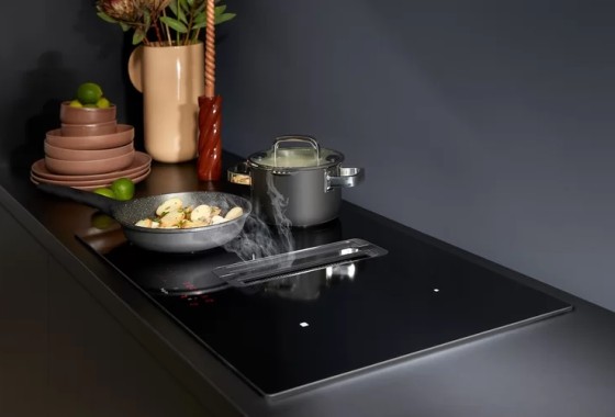 Waarom een kookplaat met afzuiging zo fijn werkt