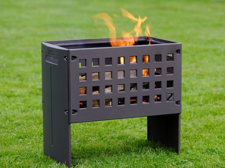 Tuinhaard Helex outfire met bbq rooster en plateau voor pannen #buitenkoken #tuin #buitenleven #tuinhaard #buitenhaard #bbq #barbecue