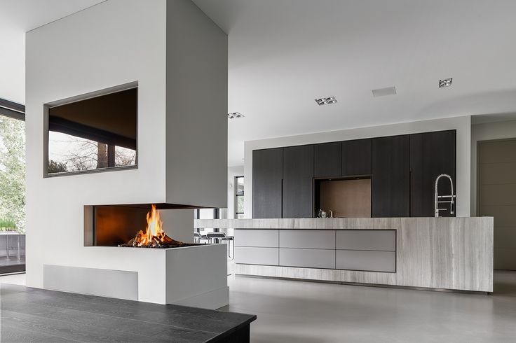 Open keuken met grote hoekhaard als ruimteverdeler. Designkeuken BloxX van Culimaat - prijs voor beste keukendesign
