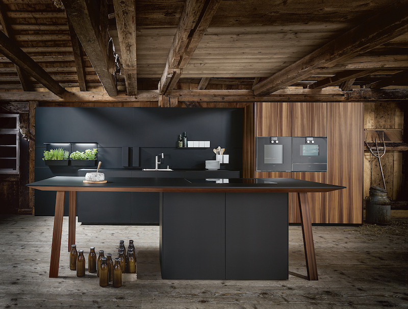 Foto Stijlvol voor de open keuken: kooktafel met werkbladafzuiging FotoStijlvol voor de open keuken: kooktafel met werkbladafzuiging